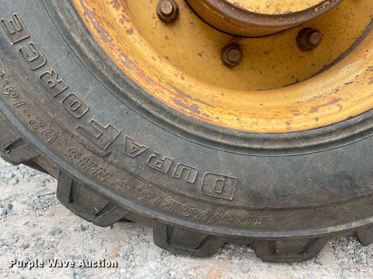 image for item DM0308 2004 John Deere 310G  backhoe