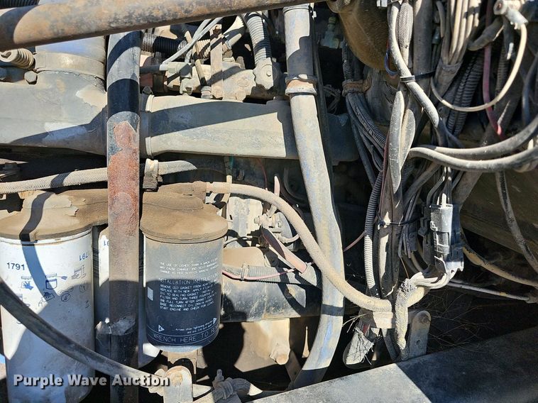 image for item DN8568 1995 Mack RD690S  water truck