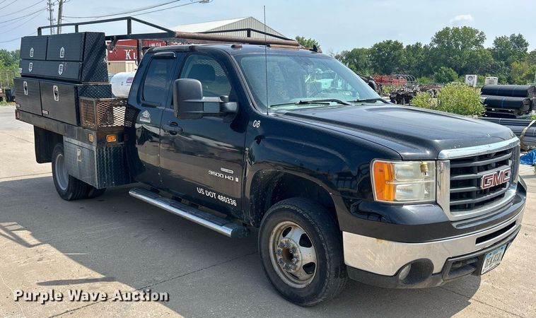 image for item DQ0860 2009 GMC Sierra 3500HD  Ext. Cab flatbed pickup truck