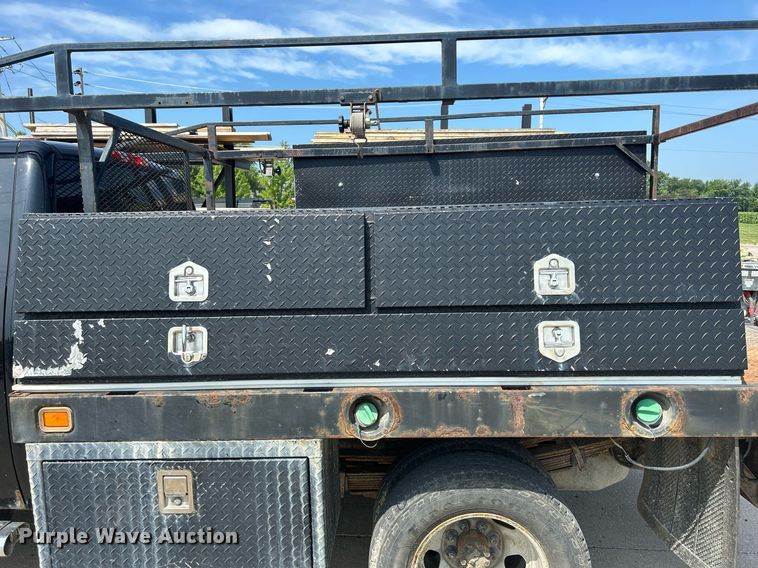 image for item DQ0860 2009 GMC Sierra 3500HD  Ext. Cab flatbed pickup truck