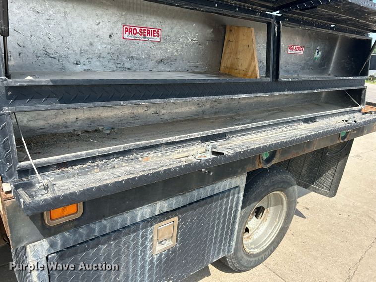 image for item DQ0860 2009 GMC Sierra 3500HD  Ext. Cab flatbed pickup truck