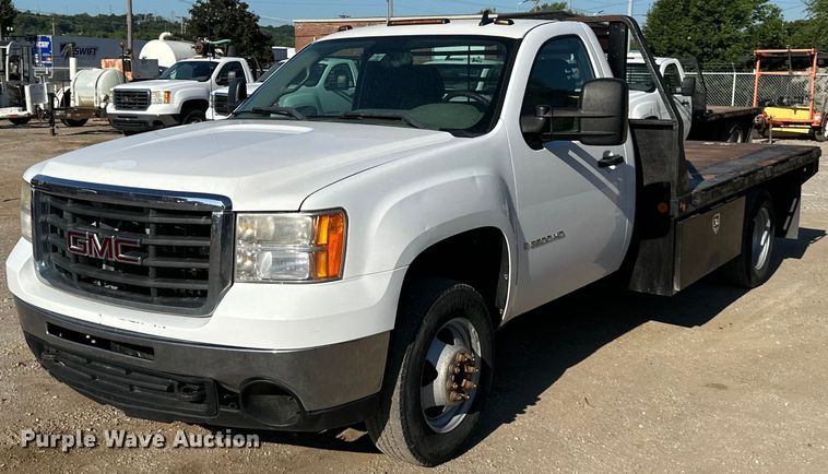 image for item DS2043 2009 GMC Sierra 3500HD  flatbed pickup truck
