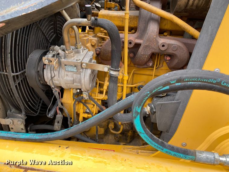 image for item KW9010 2012 John Deere 310SJ  backhoe