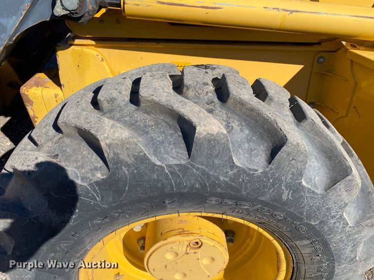 image for item KW9010 2012 John Deere 310SJ  backhoe