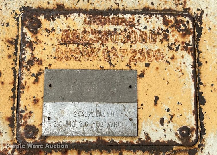 image for item OK9699 2009 John Deere 304J  wheel loader