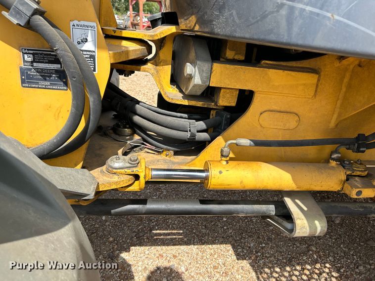 image for item OK9699 2009 John Deere 304J  wheel loader