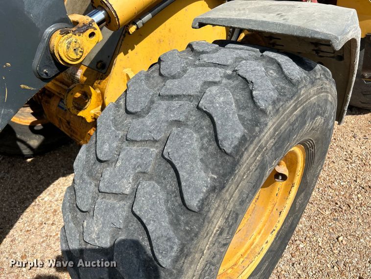 image for item OK9699 2009 John Deere 304J  wheel loader