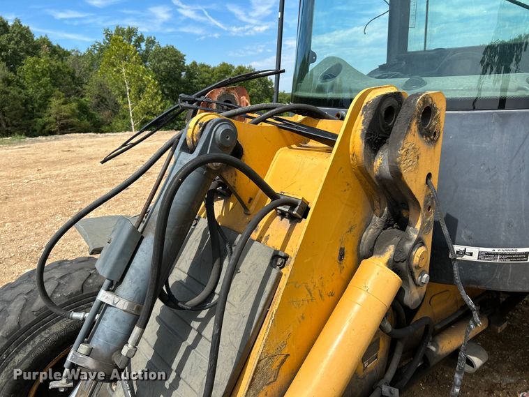image for item OK9700 2010 John Deere 304J  wheel loader