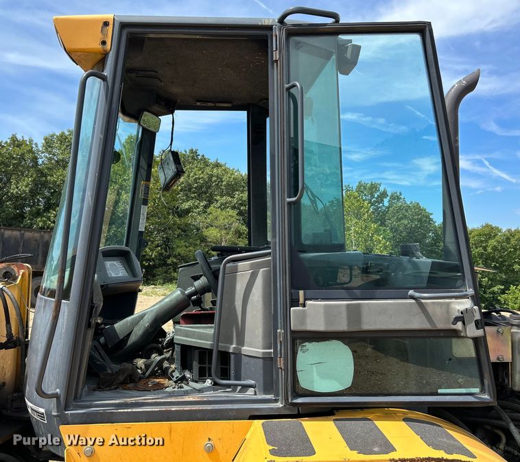 image for item OK9700 2010 John Deere 304J  wheel loader