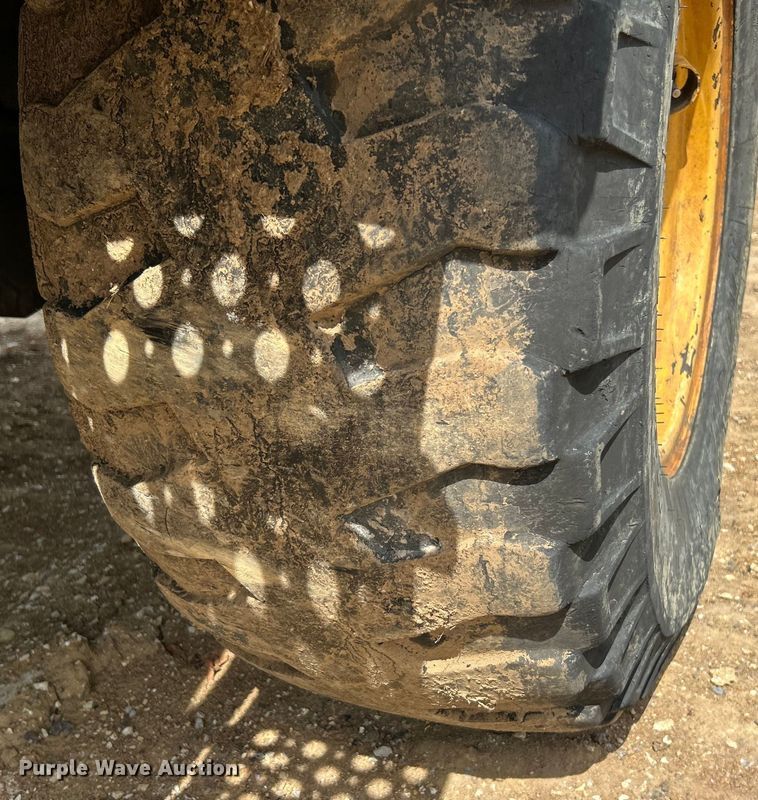 image for item OK9700 2010 John Deere 304J  wheel loader