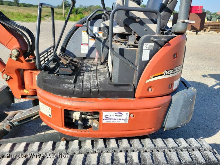 image for item DA7218 2004 Ditch Witch MX352  mini excavator