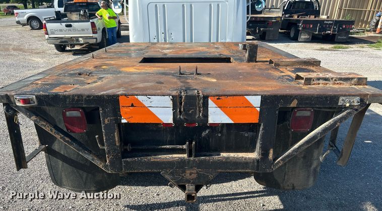 image for item DI7914 2000 International 4700  flatbed truck