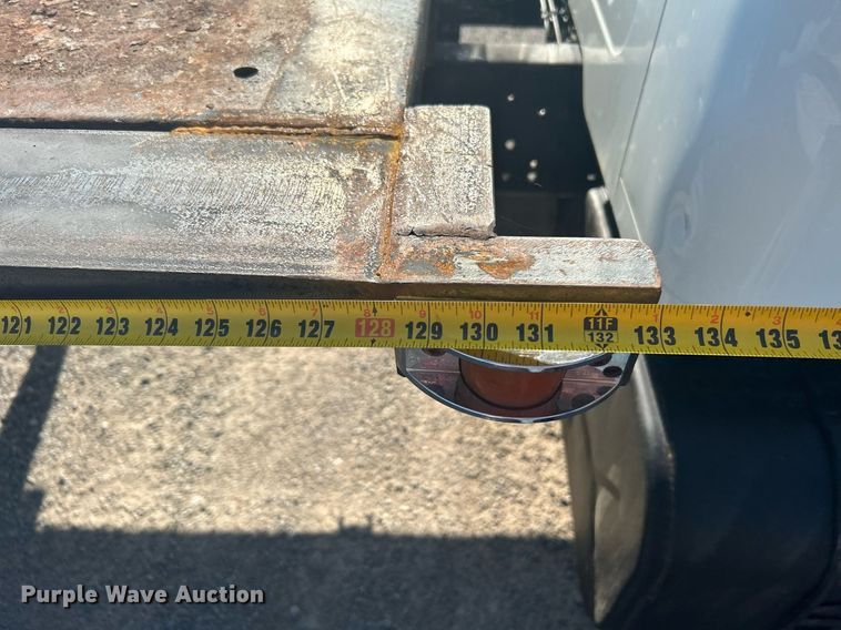 image for item DI7914 2000 International 4700  flatbed truck