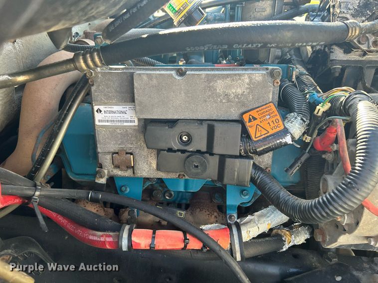 image for item DI7914 2000 International 4700  flatbed truck