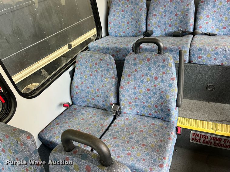 image for item LE9557 2013 Chevrolet Express  shuttle bus