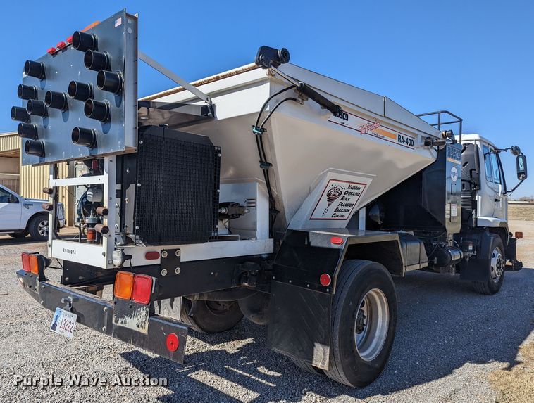 image for item LF9650 2010 Nissan 3300  pothole patcher truck