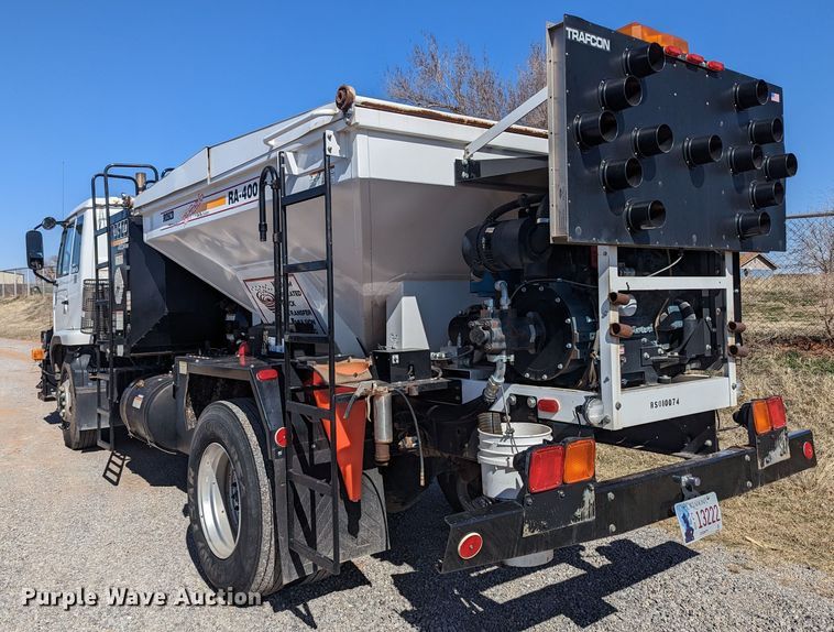 image for item LF9650 2010 Nissan 3300  pothole patcher truck