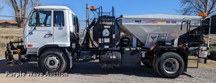 image for item LF9650 2010 Nissan 3300  pothole patcher truck