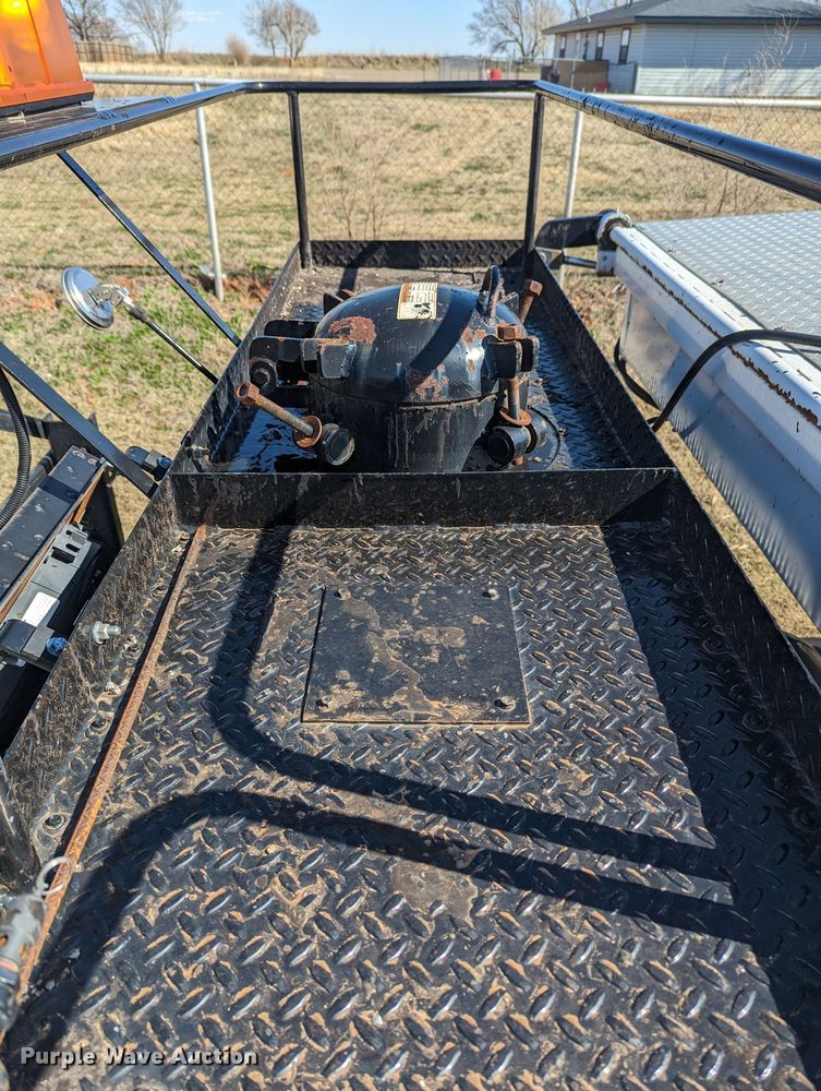 image for item LF9650 2010 Nissan 3300  pothole patcher truck