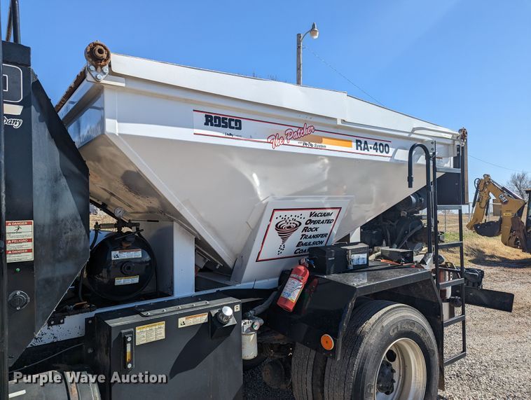 image for item LF9650 2010 Nissan 3300  pothole patcher truck