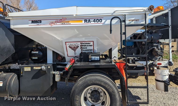 image for item LF9650 2010 Nissan 3300  pothole patcher truck