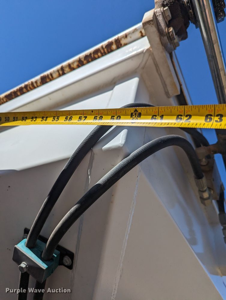 image for item LF9650 2010 Nissan 3300  pothole patcher truck