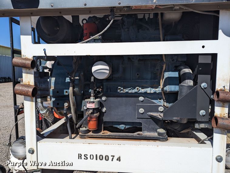 image for item LF9650 2010 Nissan 3300  pothole patcher truck