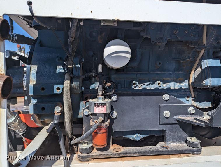 image for item LF9650 2010 Nissan 3300  pothole patcher truck