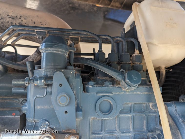 image for item LF9650 2010 Nissan 3300  pothole patcher truck