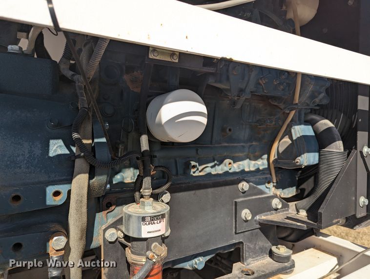 image for item LF9650 2010 Nissan 3300  pothole patcher truck