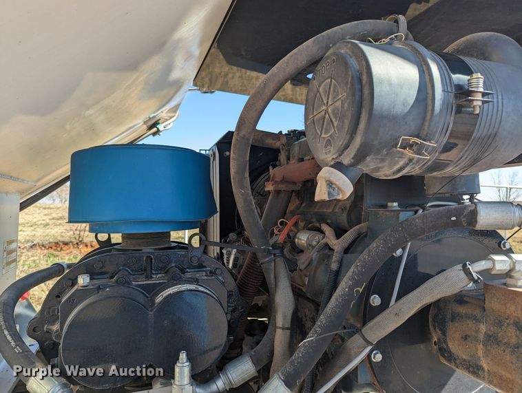 image for item LF9650 2010 Nissan 3300  pothole patcher truck