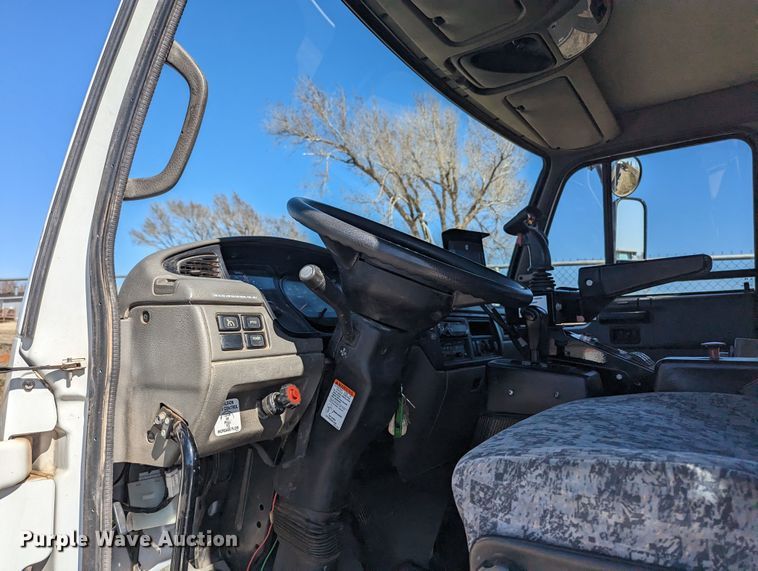 image for item LF9650 2010 Nissan 3300  pothole patcher truck