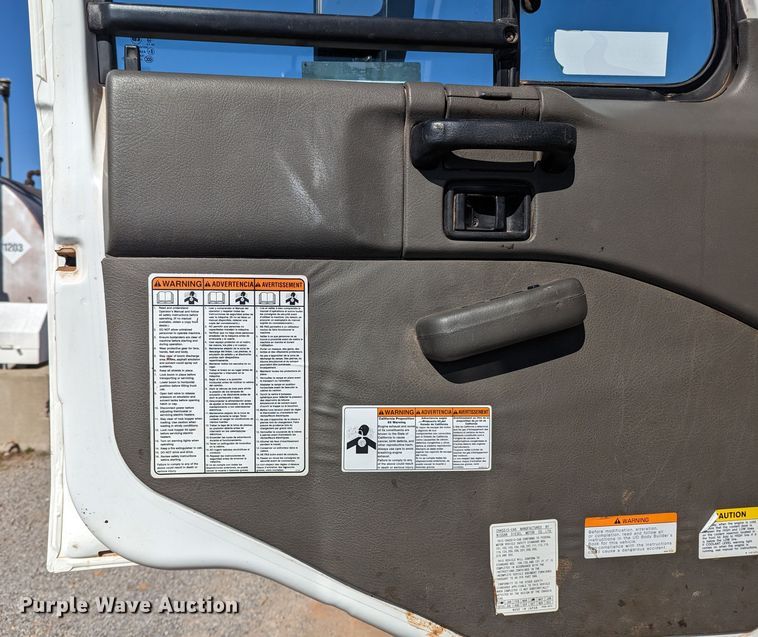 image for item LF9650 2010 Nissan 3300  pothole patcher truck