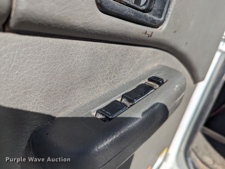 image for item LF9650 2010 Nissan 3300  pothole patcher truck