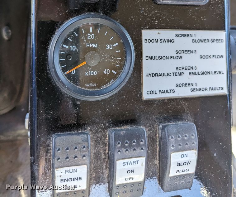 image for item LF9650 2010 Nissan 3300  pothole patcher truck