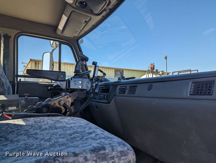 image for item LF9650 2010 Nissan 3300  pothole patcher truck