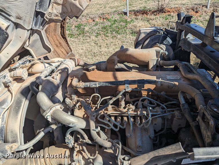 image for item LF9650 2010 Nissan 3300  pothole patcher truck