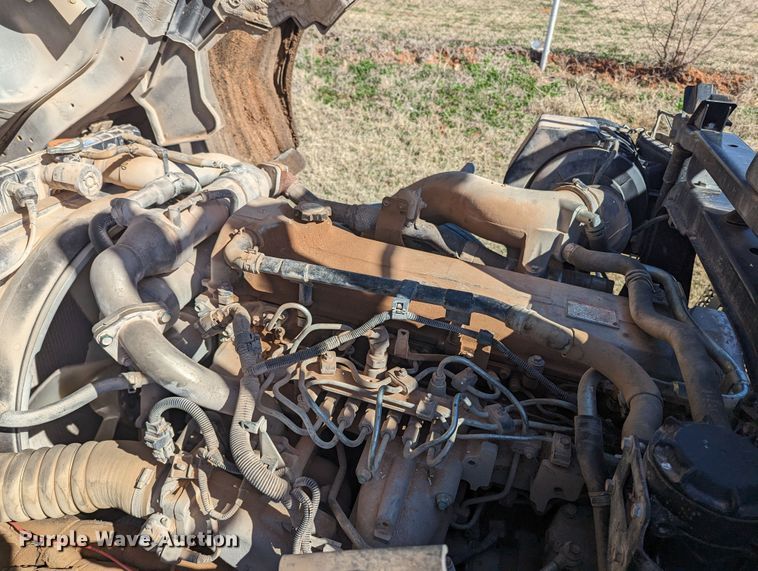 image for item LF9650 2010 Nissan 3300  pothole patcher truck