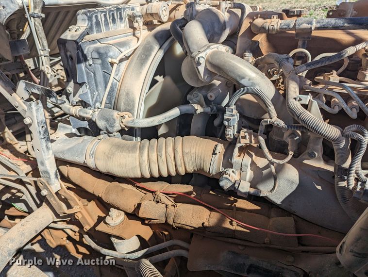 image for item LF9650 2010 Nissan 3300  pothole patcher truck