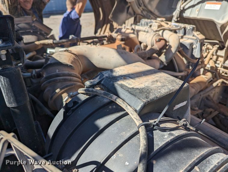 image for item LF9650 2010 Nissan 3300  pothole patcher truck