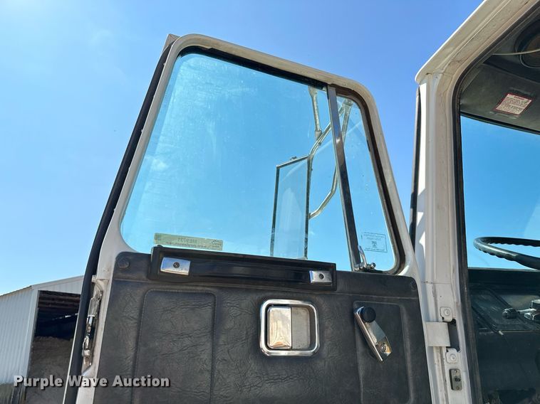 image for item MB9731 1992 White GMC WCM  semi truck