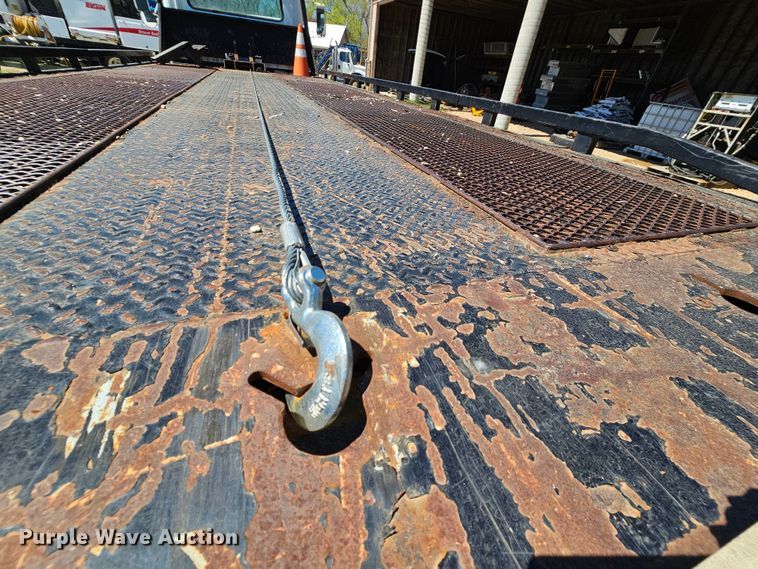 image for item MI9474 1998 International 4700  rollback truck