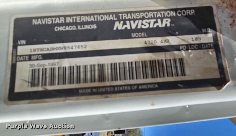 image for item MI9474 1998 International 4700  rollback truck