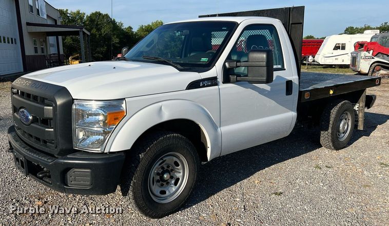 image for item NA9039 2015  Ford F250 Super Duty XL  flatbed pickup truck
