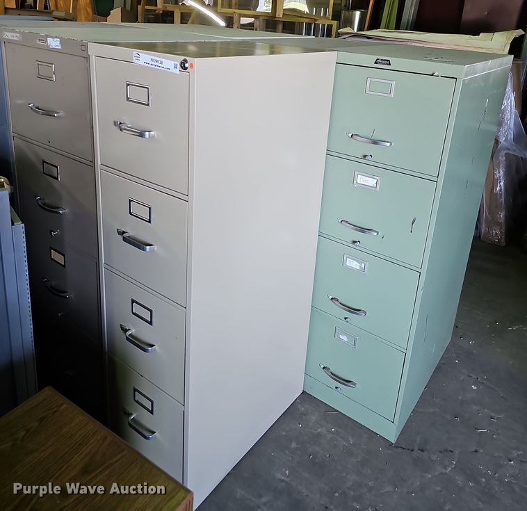 image for item NU9038 (7) four drawer file cabinets