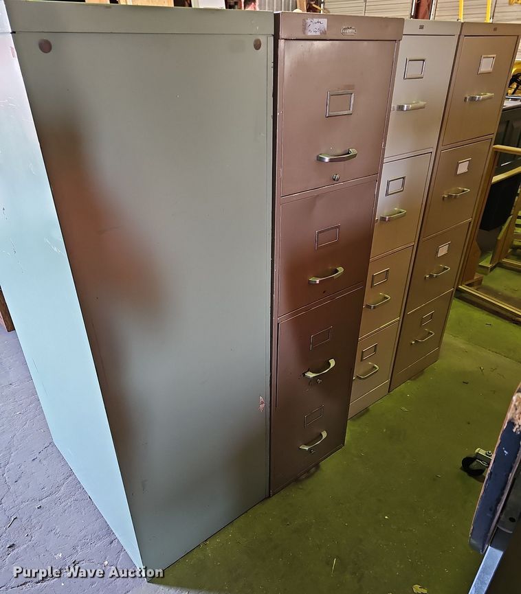 image for item NU9038 (7) four drawer file cabinets