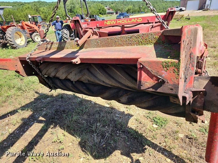 image for item NT9769 1991 New Holland 411 Discbine  swather / windrower