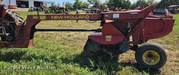 image for item NT9769 1991 New Holland 411 Discbine  swather / windrower
