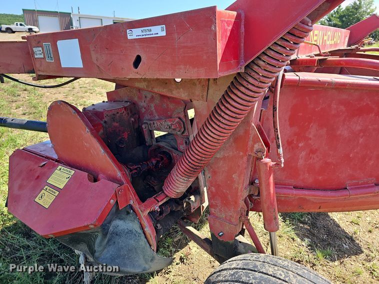 image for item NT9769 1991 New Holland 411 Discbine  swather / windrower