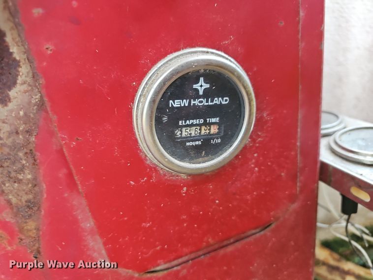 image for item NT9796 New Holland 910  swather / windrower